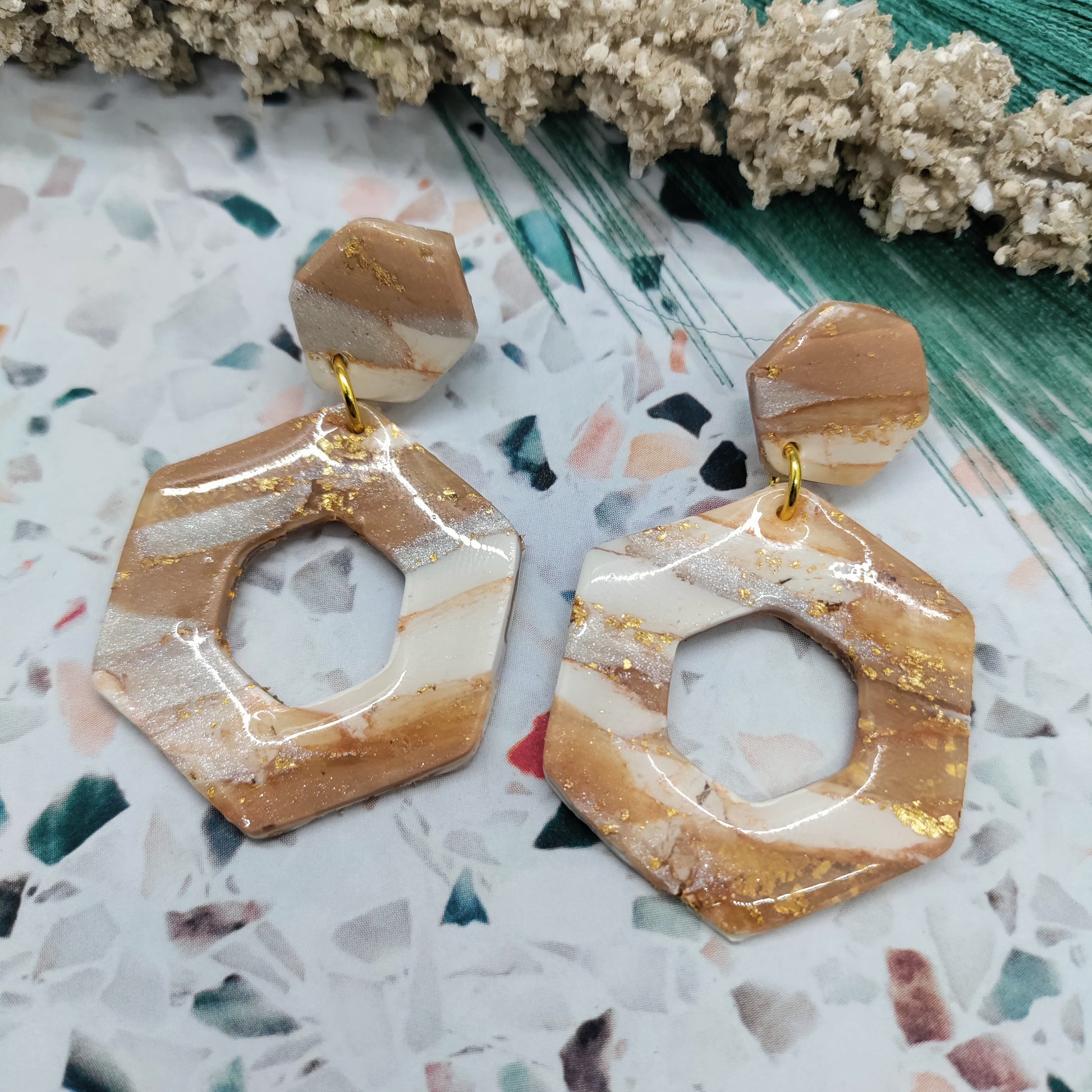 Hexagonal earrings with gold accents 