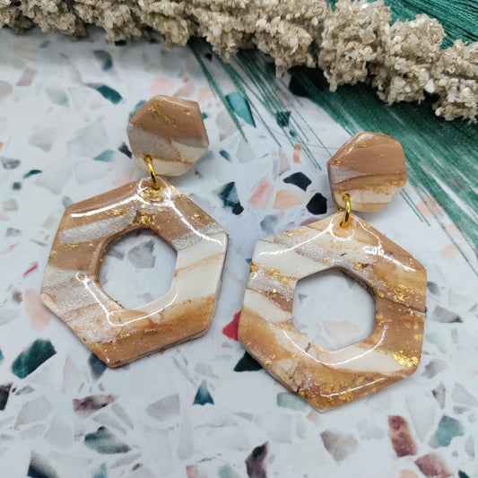 Hexagonal earrings with gold accents 
