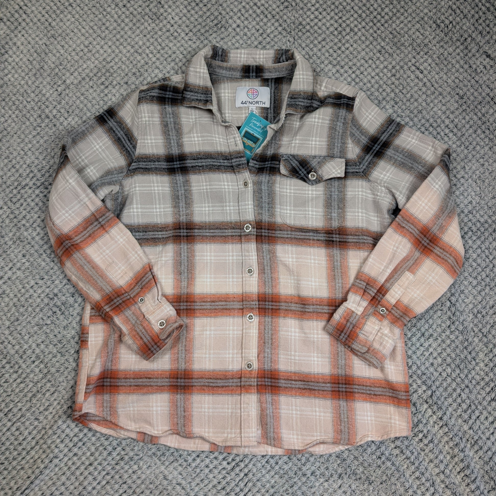 Plaid shirt on a textured gray background