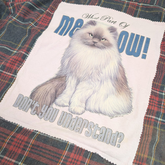 Plaid shirt with a cat graphic and text on a white background