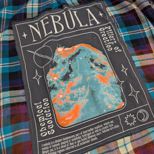 Nebula label on a plaid fabric background